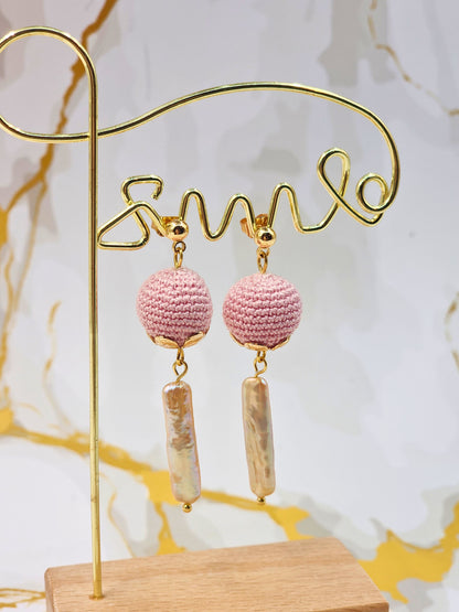 Handcrafted micro crochet pink pearls paired with unique, high lustre pink-gold Pipa pearls. Styled with 18K gold-plated studs.