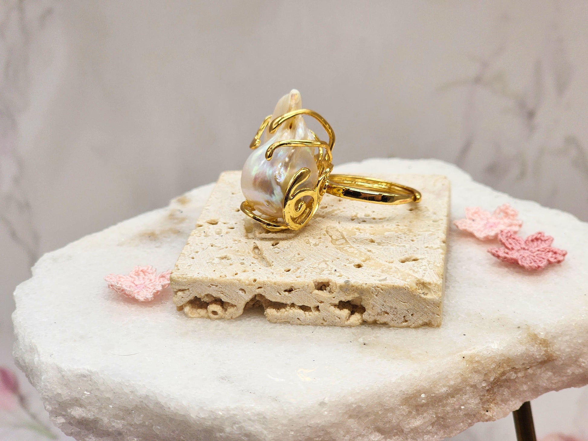 A grand 19x25mm Baroque Pearl Ring. Lustrous with a pink overtone. Flawless. Set on an 18K gold-plated band with intricate detailing. 