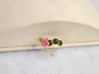 Natural Hetian Jade ring with a delicate handcrafted pink micro-crochet peach blossom on 14K gold-plated adjustable ring. 