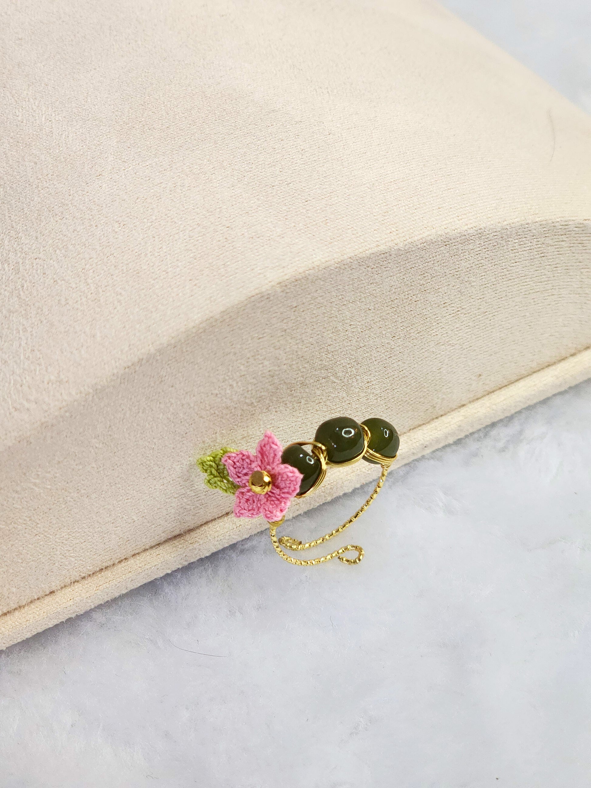Natural Hetian Jade ring with a delicate handcrafted pink micro-crochet peach blossom on 14K gold-plated adjustable ring. 
