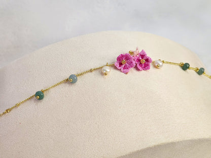 Natural Jadeite and Pearl bracelet with pink handcrafted micro-crochet peach blossoms on 18K gold-plated bracelet