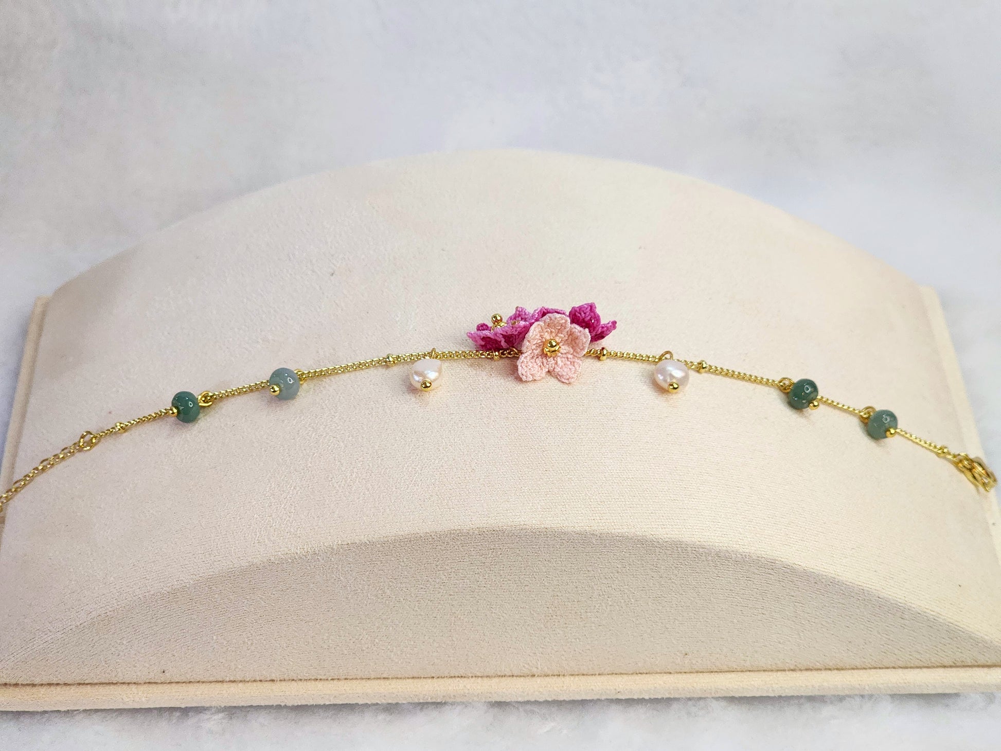 Natural Jadeite and Pearl bracelet with pink handcrafted micro-crochet peach blossoms on 18K gold-plated bracelet
