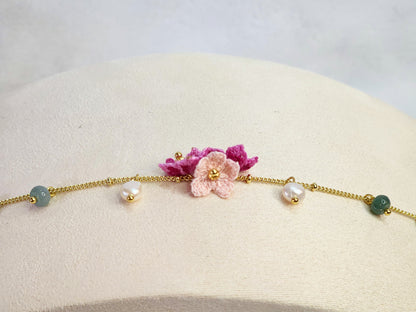 Natural Jadeite and Pearl bracelet with pink handcrafted micro-crochet peach blossoms on 18K gold-plated bracelet