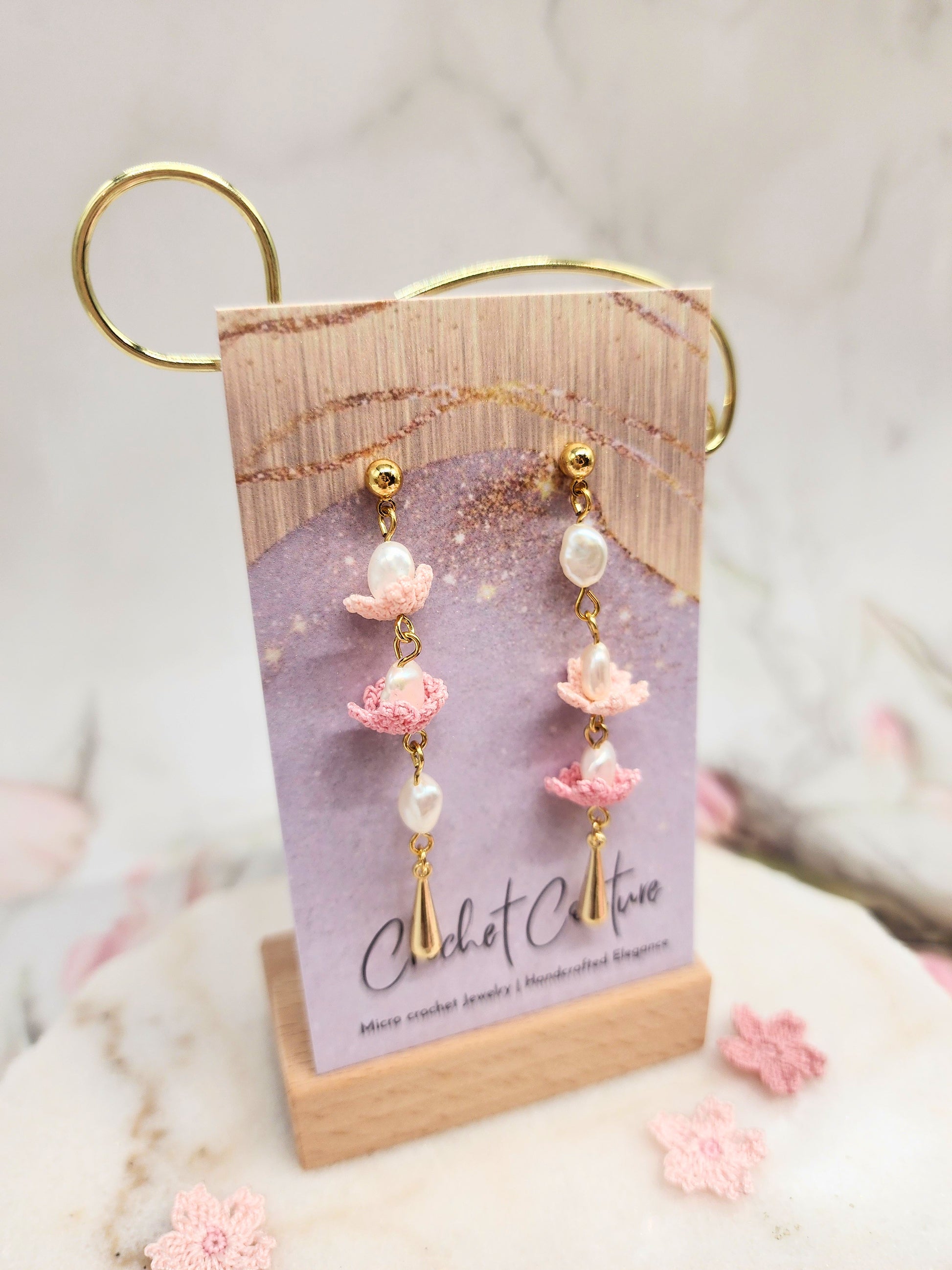 Luminous Keshi pearls and intricate micro crochet Sakura Asymmetrical Chandelier Earrings. 18K gold-plated. 