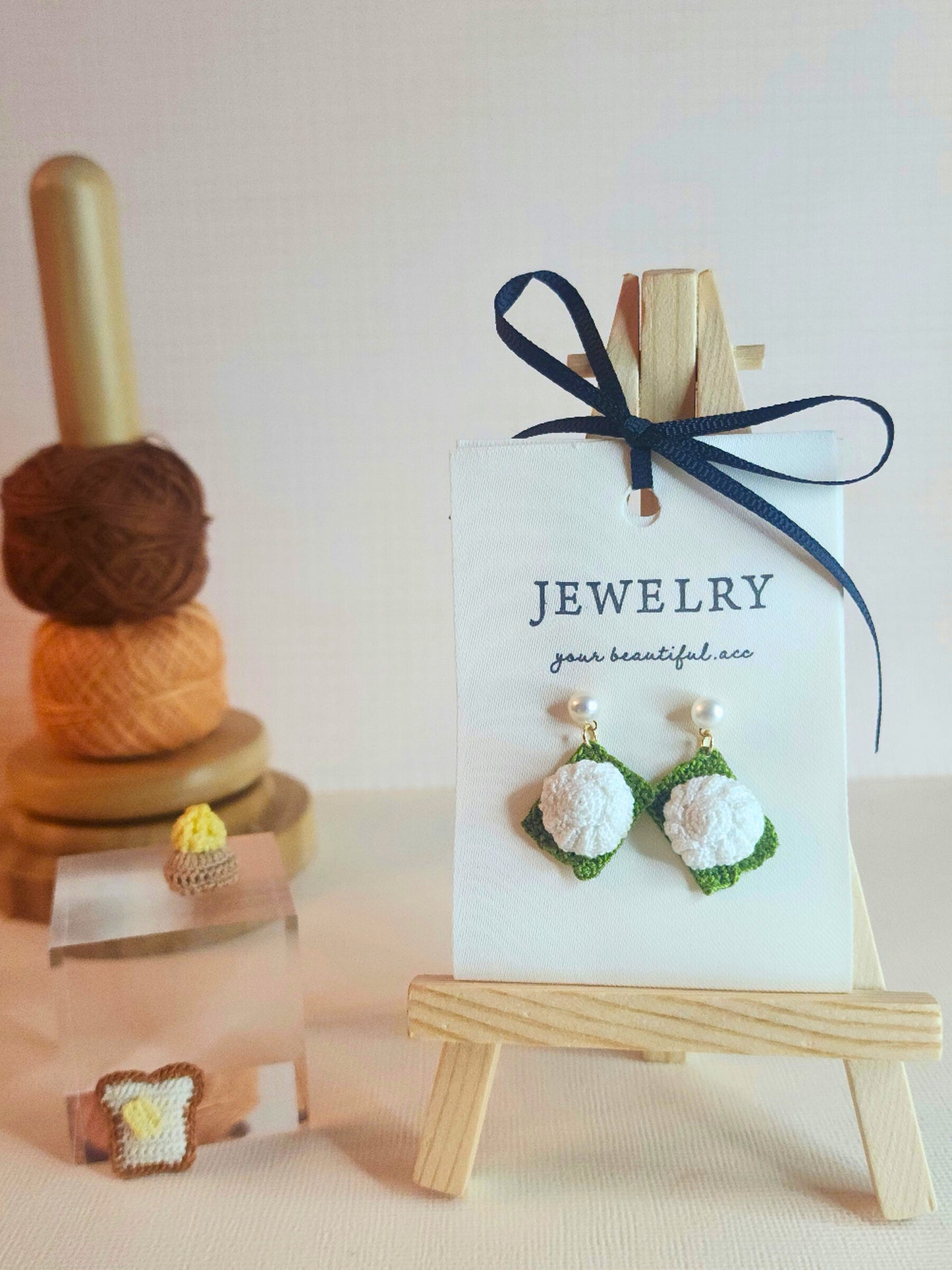 Kueh Tu Tu micro-crochet earrings adorned with 4-5mm AAA grade natural freshwater pearls and paired with 18KGP ear studs