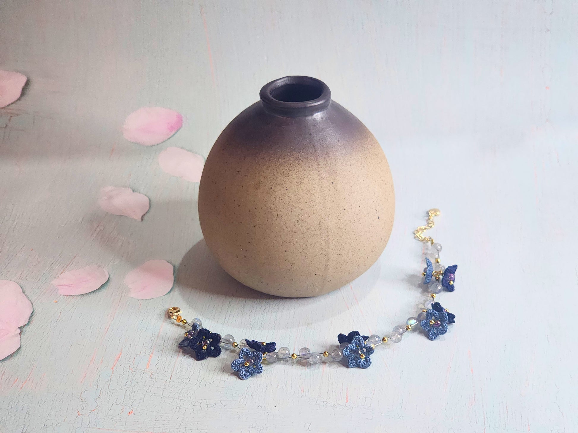 Natural Labradorite Crystals bracelet with blue micro-crochet start flowers in two shades of blue. Accented with Miyuki glass beads from Japan.