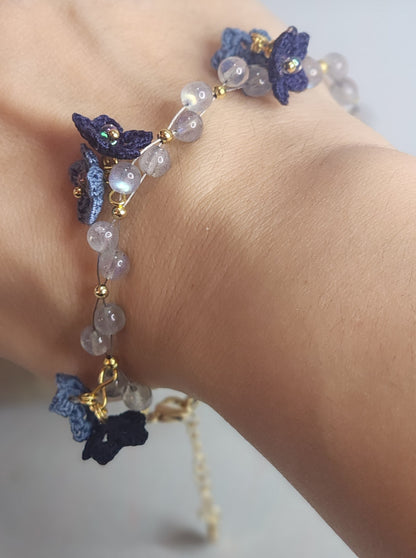Natural Labradorite Crystals bracelet with blue micro-crochet start flowers in two shades of blue. Accented with Miyuki glass beads from Japan.