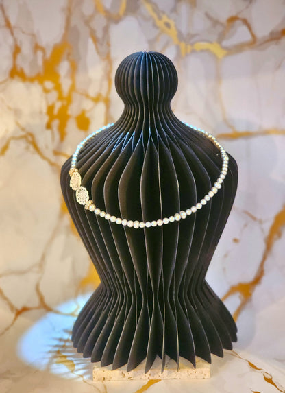 Handcrafted lace motifs paired with luminous 4-6mm silver-grey baroque pearls necklace. Accented with gold-plated cubic zirconia beads and S925 clasp.