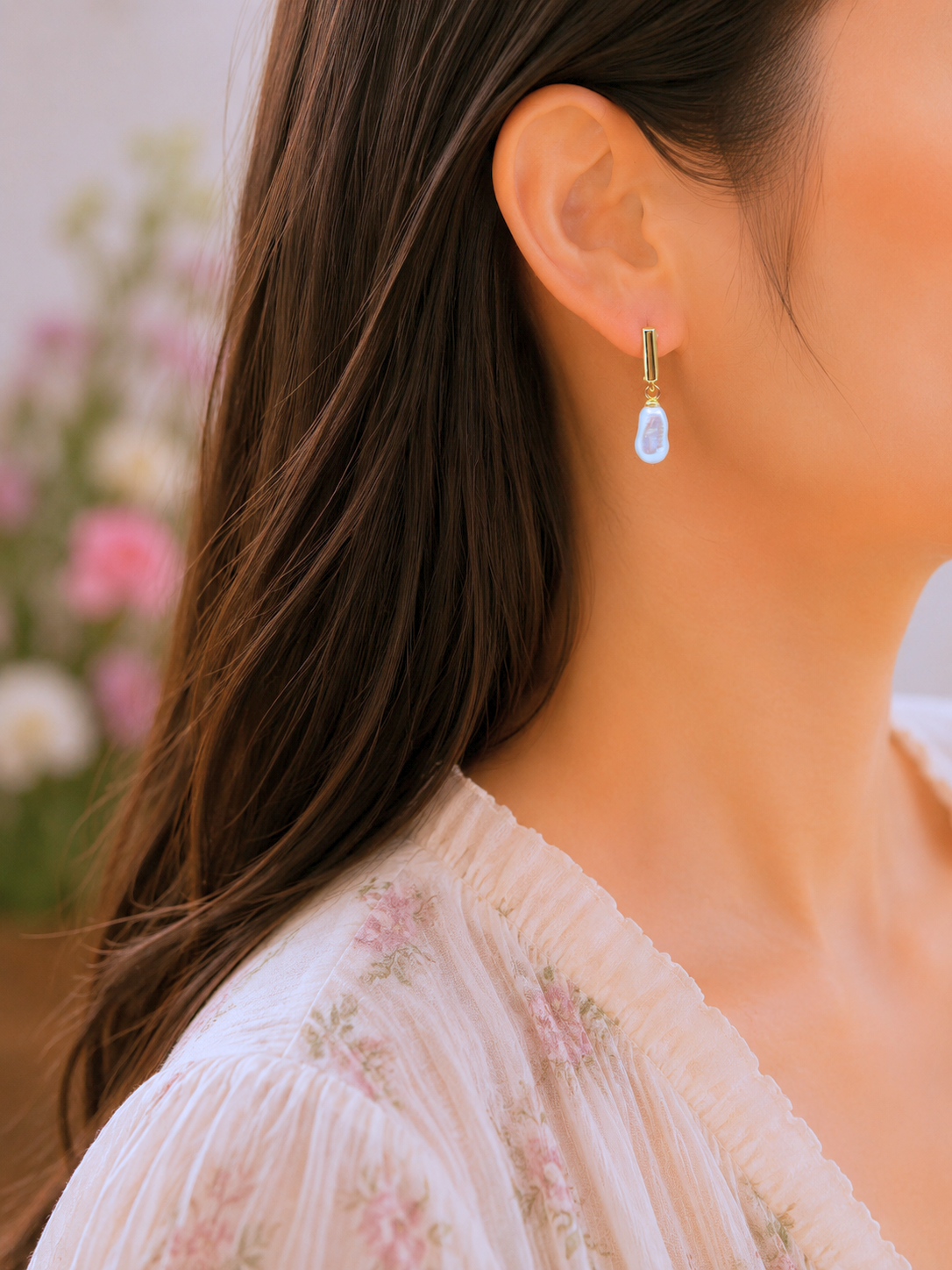 Luminous 8–9mm freshwater Keshi pearls drop earrings. Finished with gold vermeil studs. 