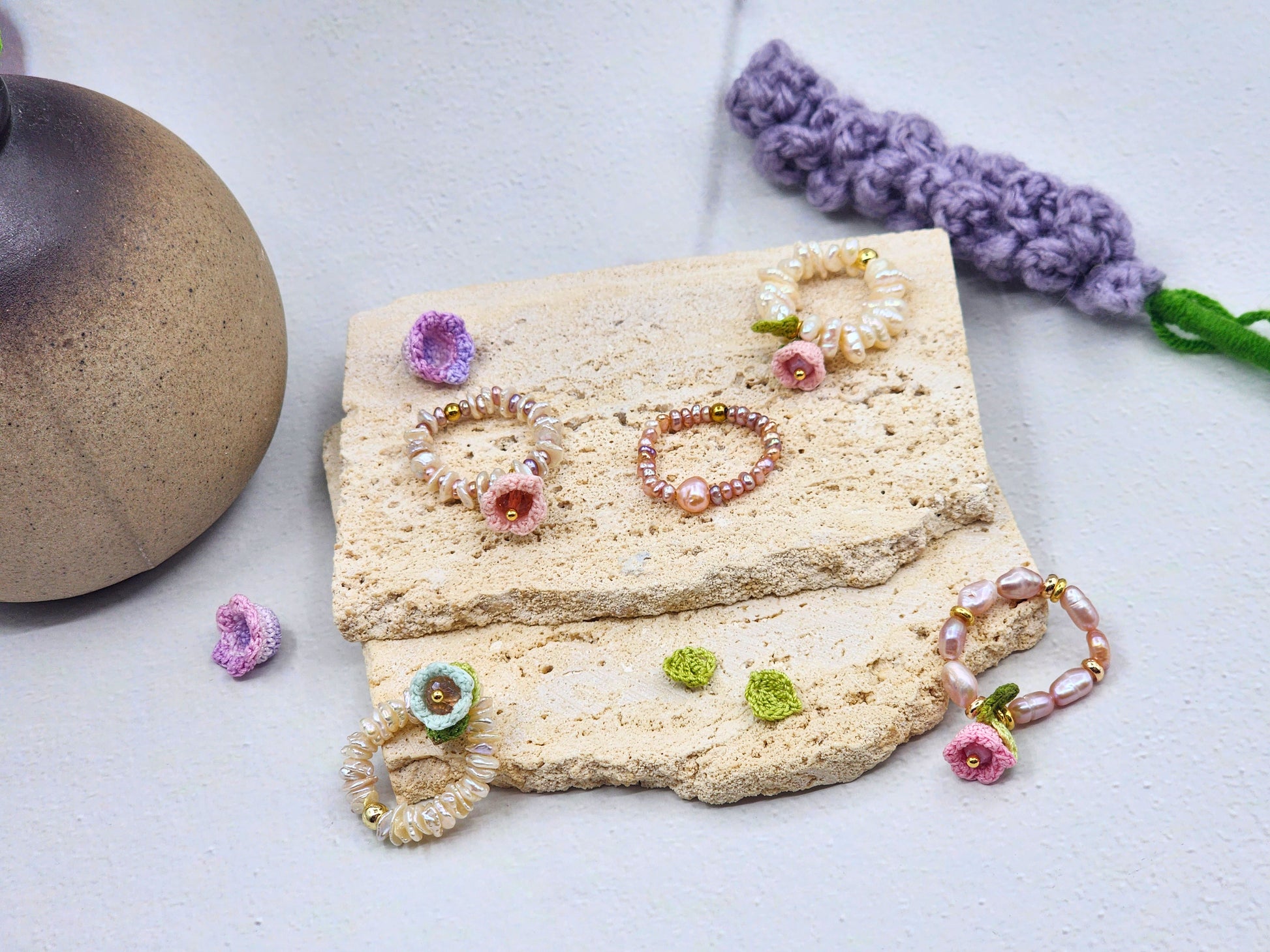 Handcrafted beaded rings featuring delicate micro crochet Lily of the Valley blooms paired with carefully selected natural pearls. 