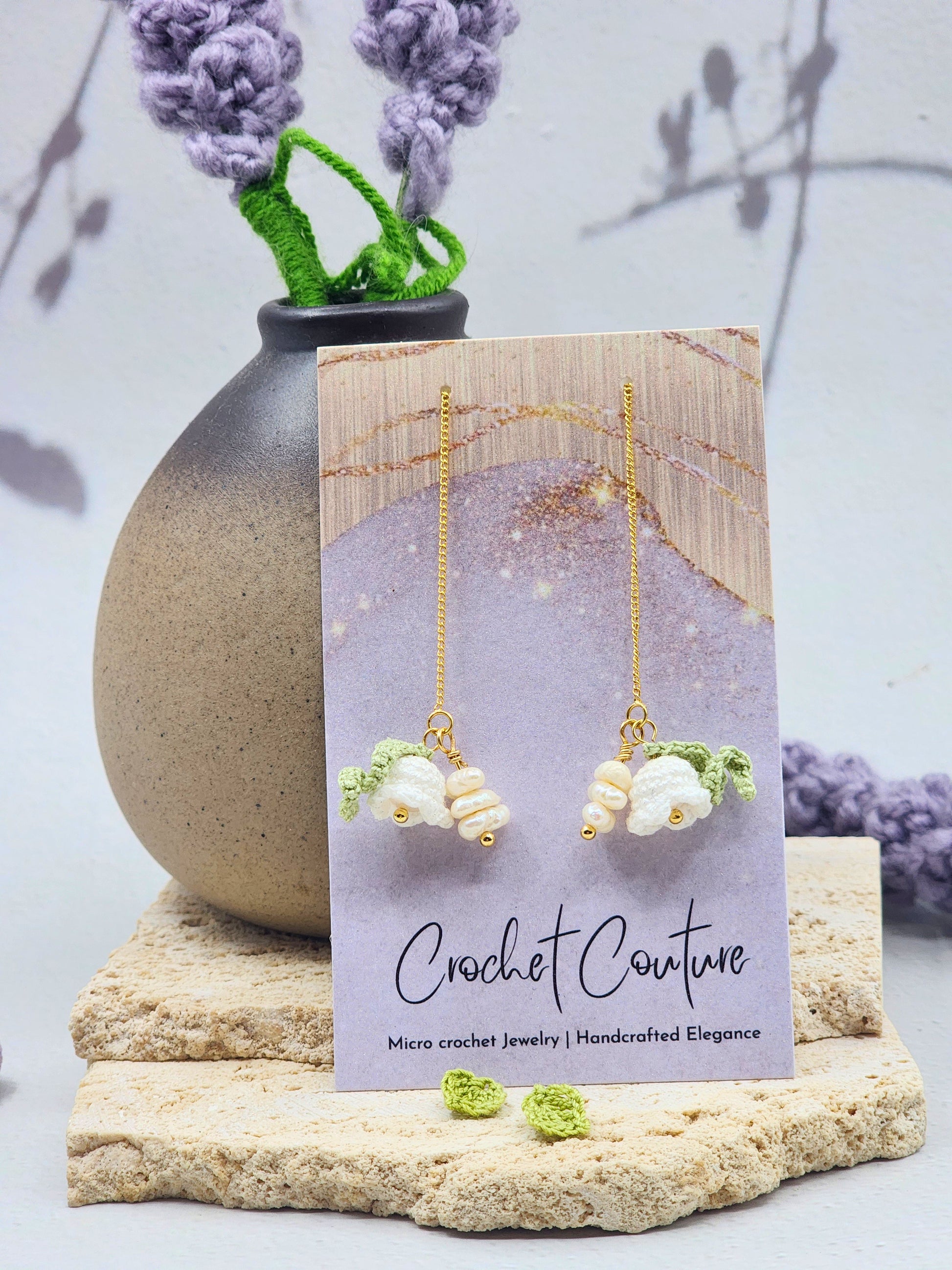 Handcrafted micro crochet Lily of the Valley blooms earrings crowned with luminous 5–6mm freshwater baroque pearls and 4–5mm stacked baroque ones. 18K gold-plated tassel earrings. 