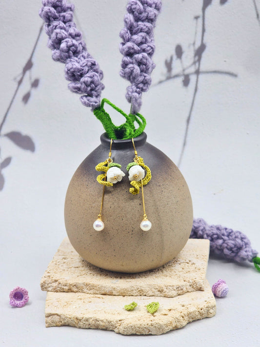 Handcrafted micro crochet Lily of the Valley blooms accented with 6–7mm freshwater Akoya teardrop pearls and luminous 6mm freshwater Aurora pearls. Gold vermeil hooks. 