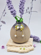 Handcrafted micro crochet Lily of the Valley blooms accented with 6–7mm freshwater Akoya teardrop pearls and luminous 6mm freshwater Aurora pearls. Gold vermeil hooks. 