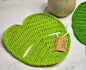 Monstera crocheted table decor in forest green