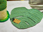 Monstera crocheted table centerpiece in dark green