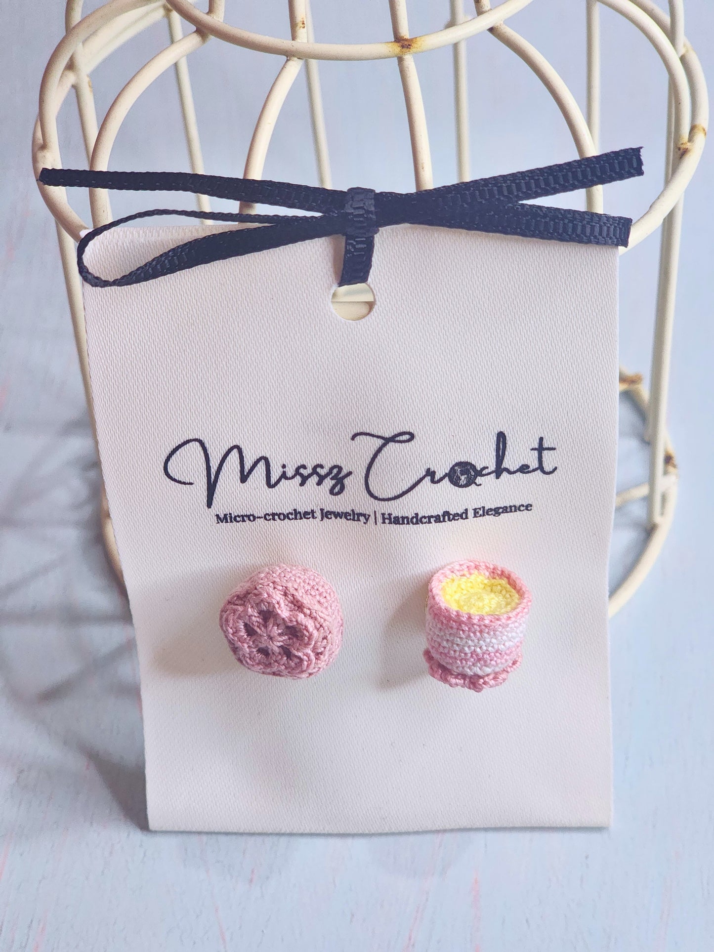 Handcrafted micro-crochet earrings featuring a mooncake & jasmine tea. 18K gold-plated ear hooks. 