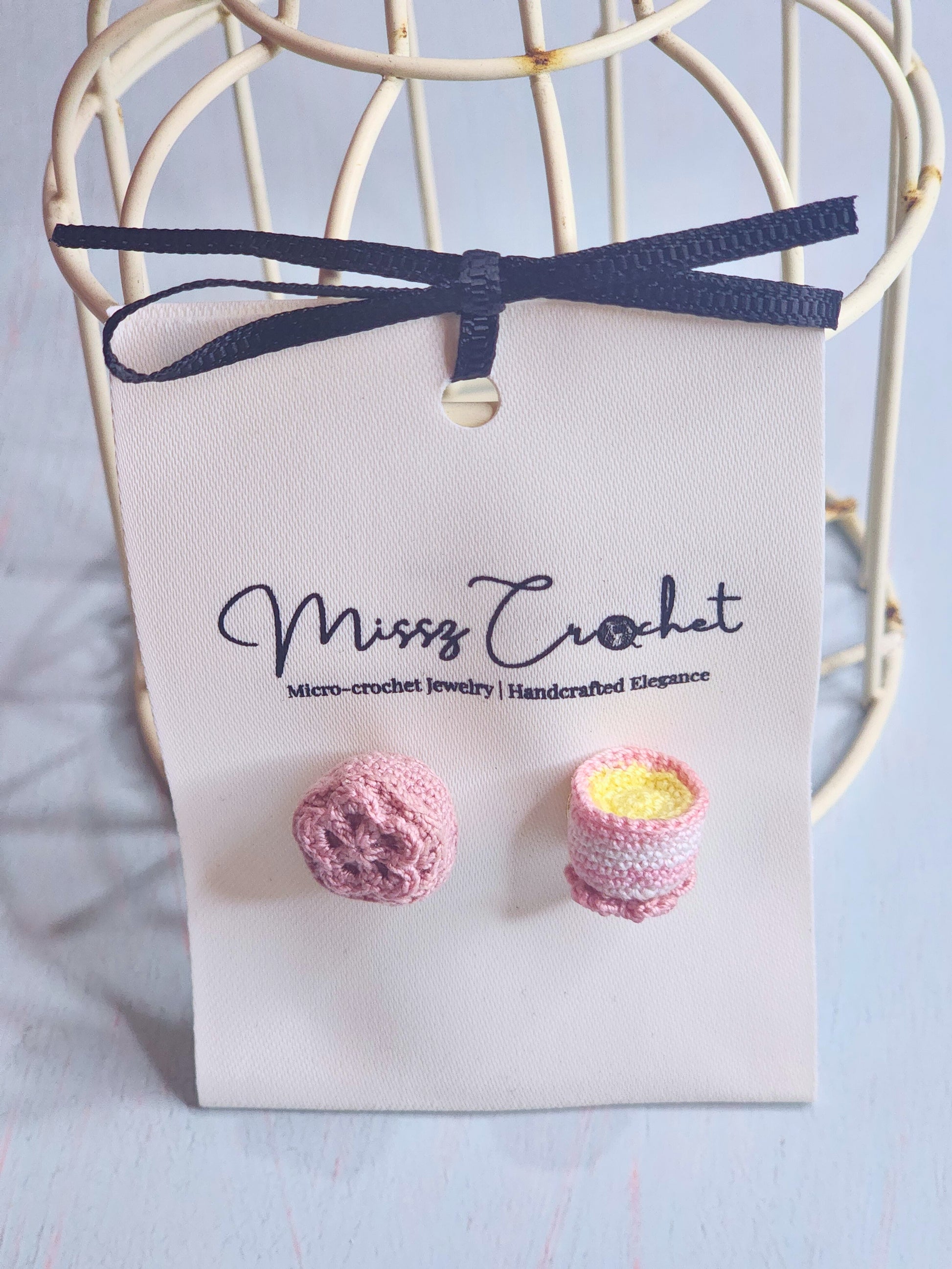 Handcrafted micro-crochet earrings featuring a mooncake & jasmine tea. 18K gold-plated ear hooks. 