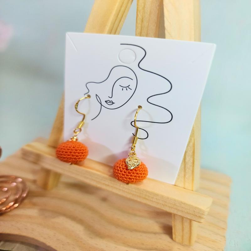 Handcrafted orange micro-crochet earrings in 18K gold-plated leaf and findings