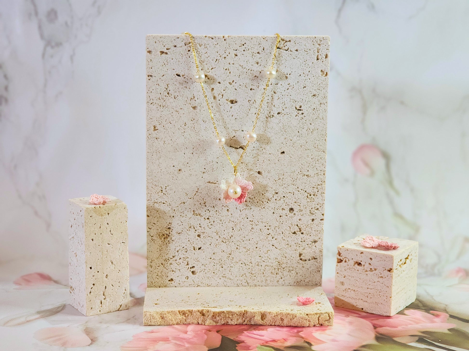 Freshwater Pearls Choker with Micro-crochet Sakura & Pearl pendant. Handcrafted and paired with an 18K gold-plated chain.   