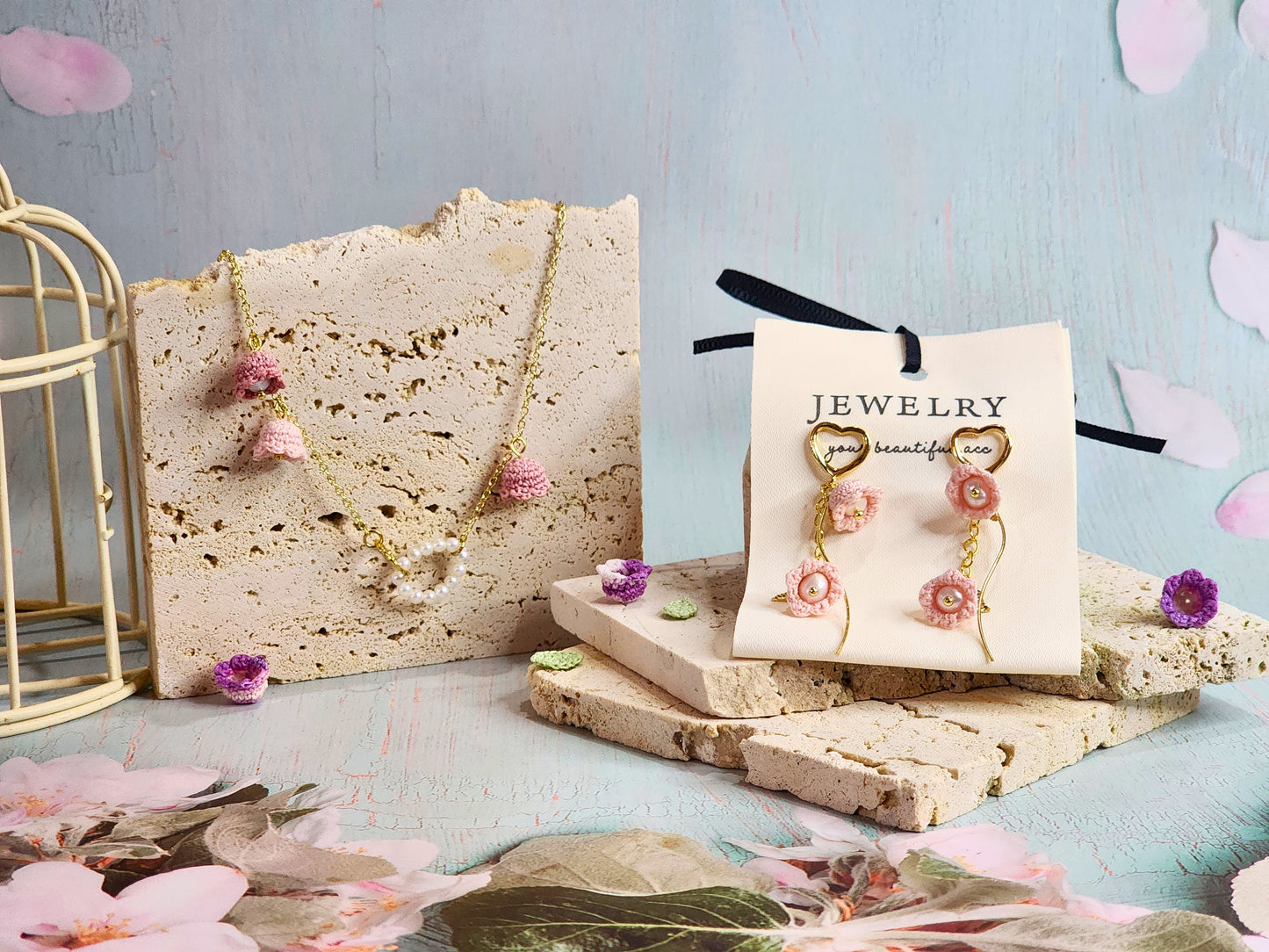Handcrafted micro-crochet pink Lilies of the Valley with freshwater pearls earrings, paired with 18K gold-plated heart-shaped studs and findings