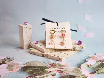 Handcrafted micro-crochet pink Lilies of the Valley with freshwater pearls earrings, paired with 18K gold-plated heart-shaped studs and findings