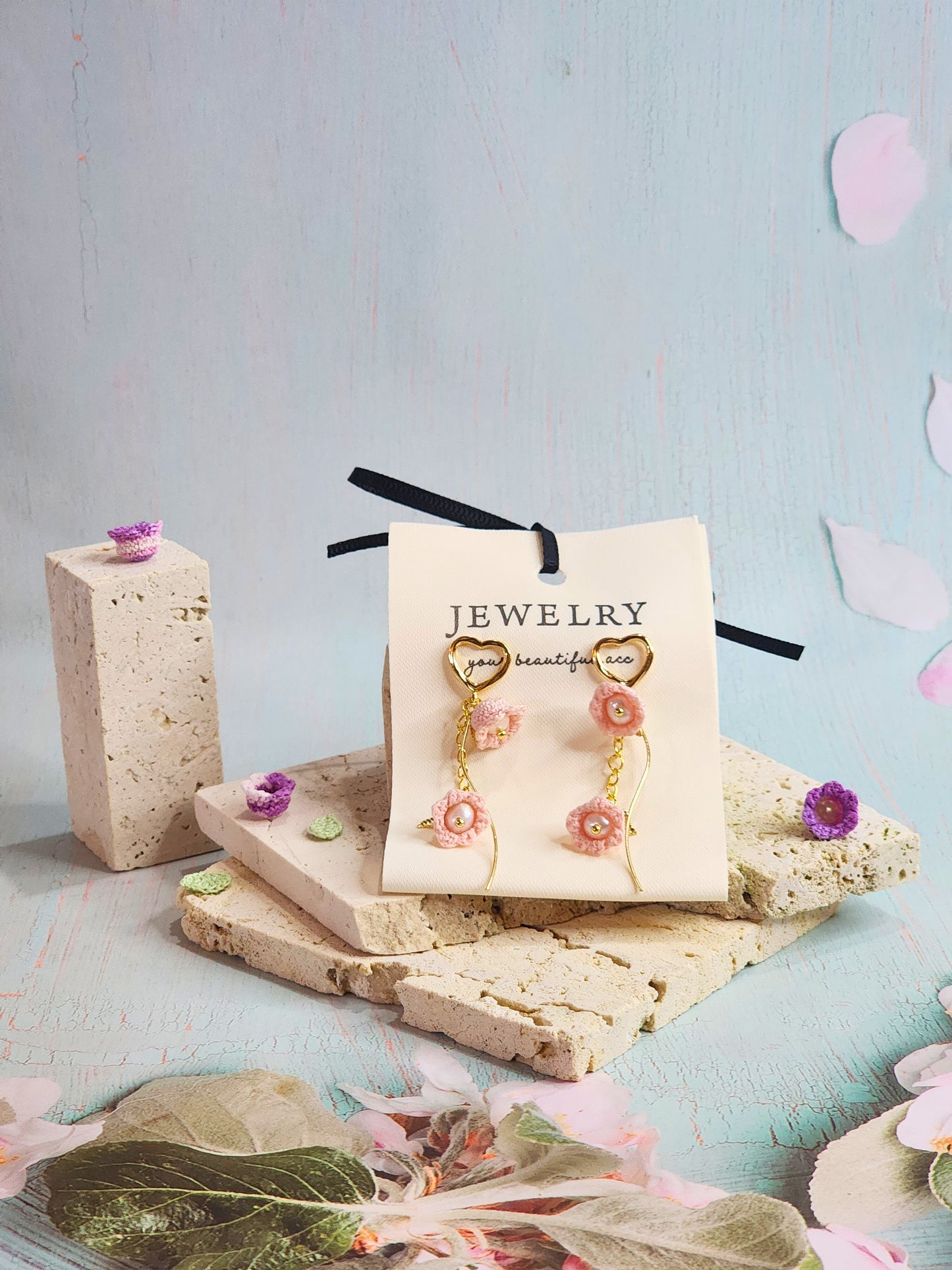 Handcrafted micro-crochet pink Lilies of the Valley with freshwater pearls earrings, paired with 18K gold-plated heart-shaped studs and findings