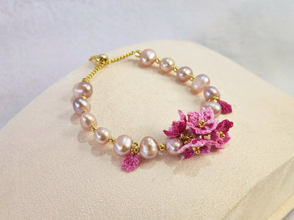 Purple natural Baroque pearl bracelet with pink micro-crochet peach blossoms on 18K gold-plated bracelet.