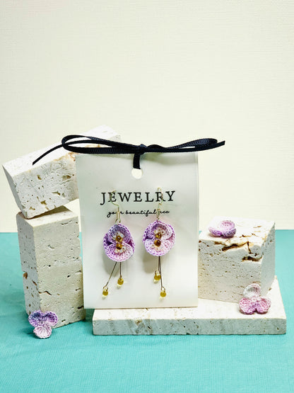 A pair of luxury micro-crochet purple poppy dangle earrings