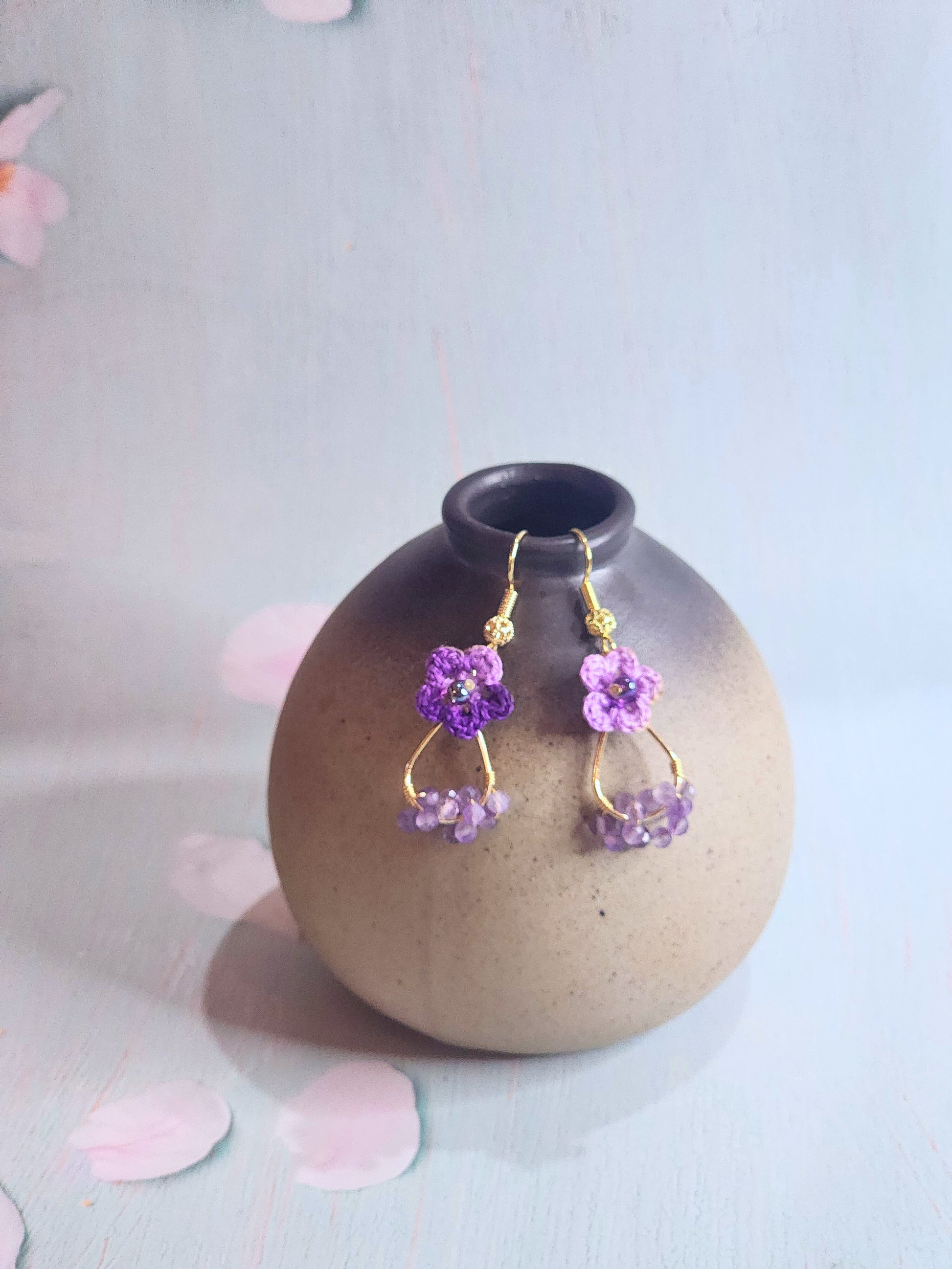 Handcrafted micro-crochet star flowers earrings with natural Amethyst crystals and Miyuki glass beads from Japan. 18K gold-plated ear hooks.