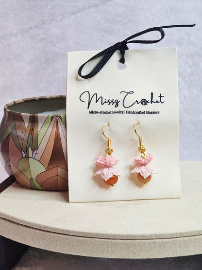 Natural Quartz Crystal with micro-crochet peach blossoms earrings. On 18K gold-plated ear hooks. 