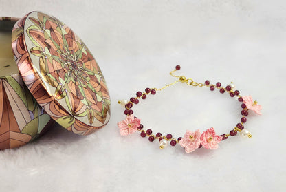 Natural red garnet crystals and pearls bracelet with handcrafted micro-crochet peach blossoms on 18K gold-plated bracelet