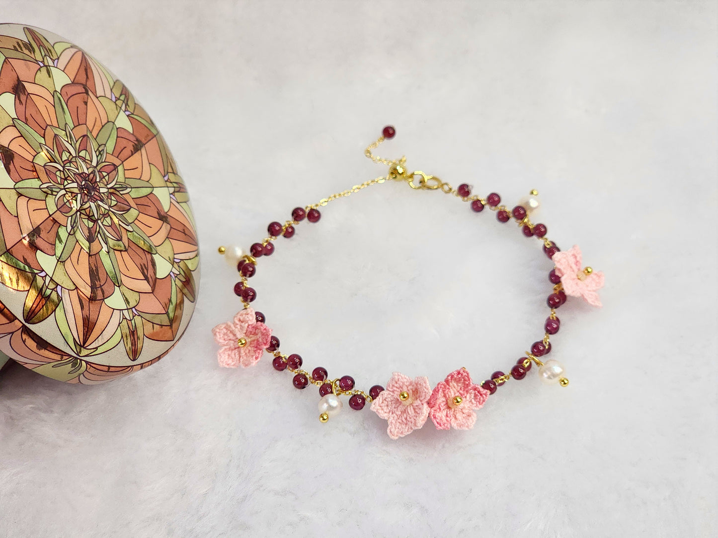 Natural red garnet crystals and pearls bracelet with handcrafted micro-crochet peach blossoms on 18K gold-plated bracelet