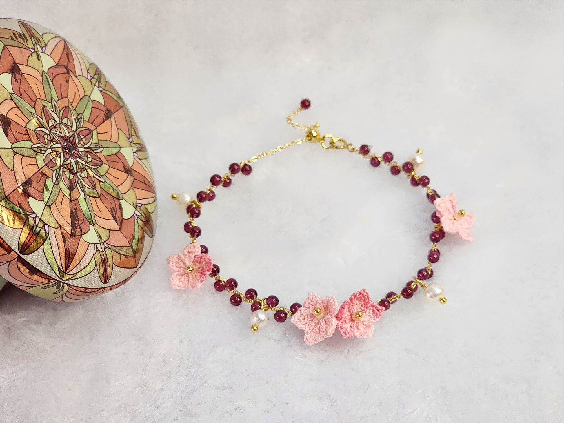 Natural red garnet crystals and pearls bracelet with handcrafted micro-crochet peach blossoms on 18K gold-plated bracelet