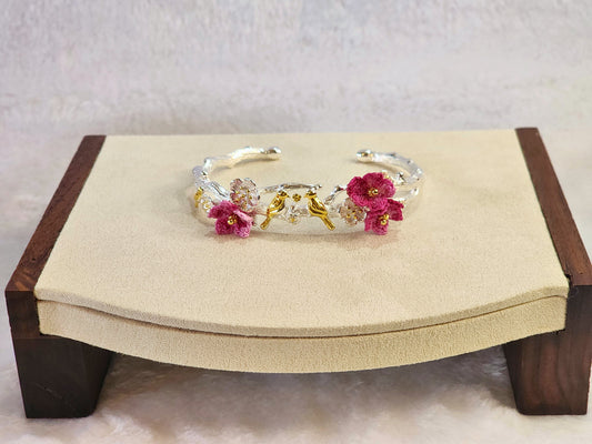 Sterling silver birds on a branch bracelet and pink handcrafted micro-crochet peach blossoms