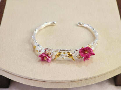 Sterling silver birds on a branch bracelet and pink handcrafted micro-crochet peach blossoms
