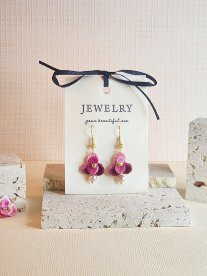 Singapore Orchid micro-crochet earrings adorned with pink-purple natural baroque pearls and paired with 18KGP findings & hook