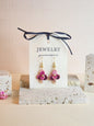 Singapore Orchid micro-crochet earrings adorned with pink-purple natural baroque pearls and paired with 18KGP findings & hook