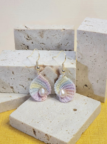 A pair of limited edition micro-crochet seashell with real baroque pink pearls earrings