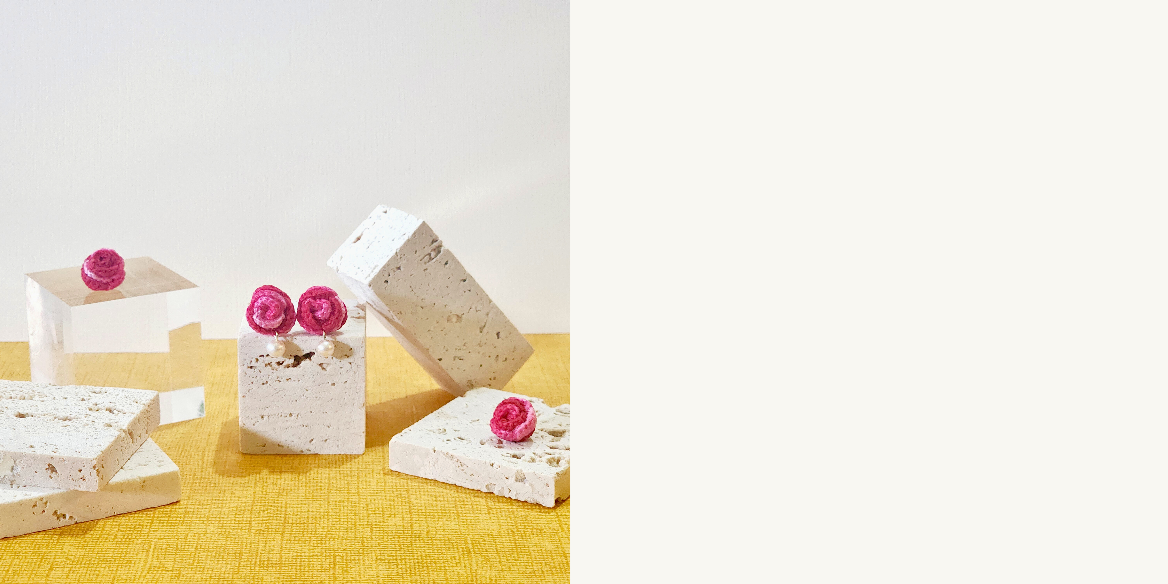 A pair of rose with freshwater pearls micro-crochet earrings