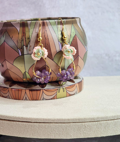 Handcrafted micro-crochet pink snowdrops with Czech crystals and natural Amethyst crystals. 18K gold-plated ear hooks. 