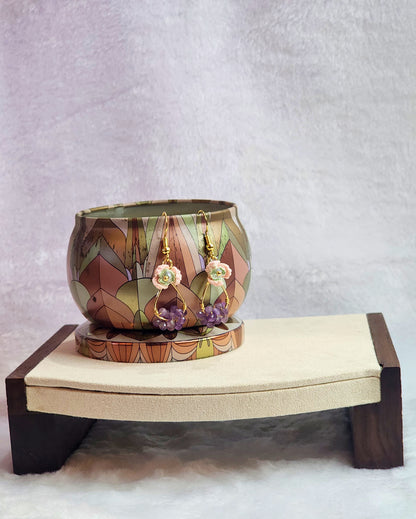 Handcrafted micro-crochet pink snowdrops with Czech crystals and natural Amethyst crystals. 18K gold-plated ear hooks. 