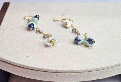 Handcrafted micro-crochet snowdrops & 4-5mm peacock blue pearls chandelier earrings. Miyuki waterdrop glass beads, on 18K gold-plated findings & hooks. 