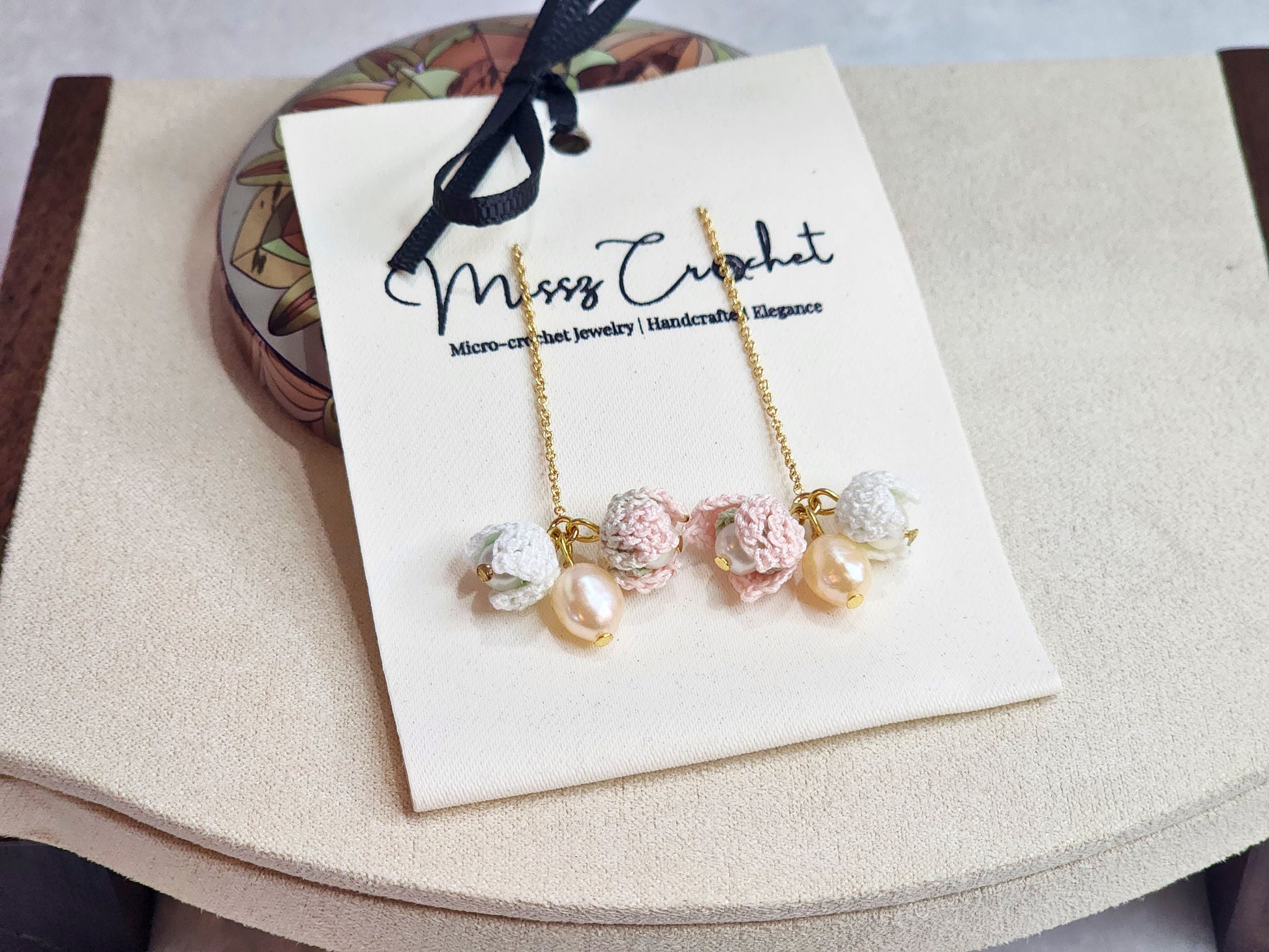 Handcrafted trio of micro-crochet snowdrops & white and pink pearls tassel earrings. 18K gold-plated hooks