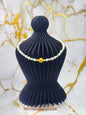 Handcrafted gold crochet pearl beautifully framed by 7–9mm high-lustre, near-flawless teardrop pearls.  Complemented by 18K gold-plated accent beads and an elegant clasp.
