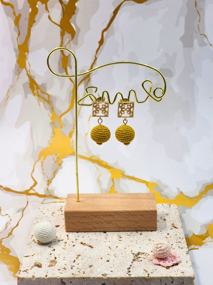 Handcrafted gold crochet pearls inspired by luxurious South Sea pearls. Finished with 18K gold-plated lace studs.