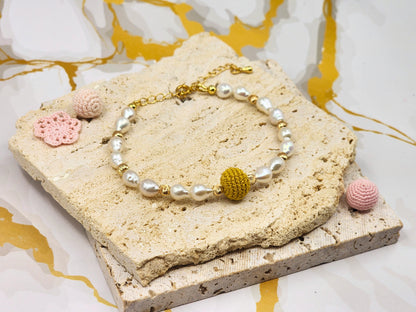 Handcrafted “gold crochet pearl” bracelet inspired by luminous South Sea pearls. Beautifully framed by 5–6mm high lustre, flawless teardrop-shaped pearls. Styled with 18K gold-plated bead accents and clasp.