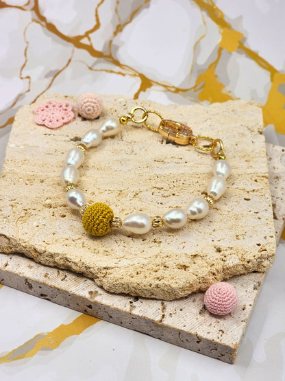 Handcrafted “South Sea Gold Crochet Pearl” beautifully framed by 7–8mm high lustre, flawless teardrop-shaped pearls. Styled with 18K gold-plated bead accents and a clasp with sparkling cubic zirconia.