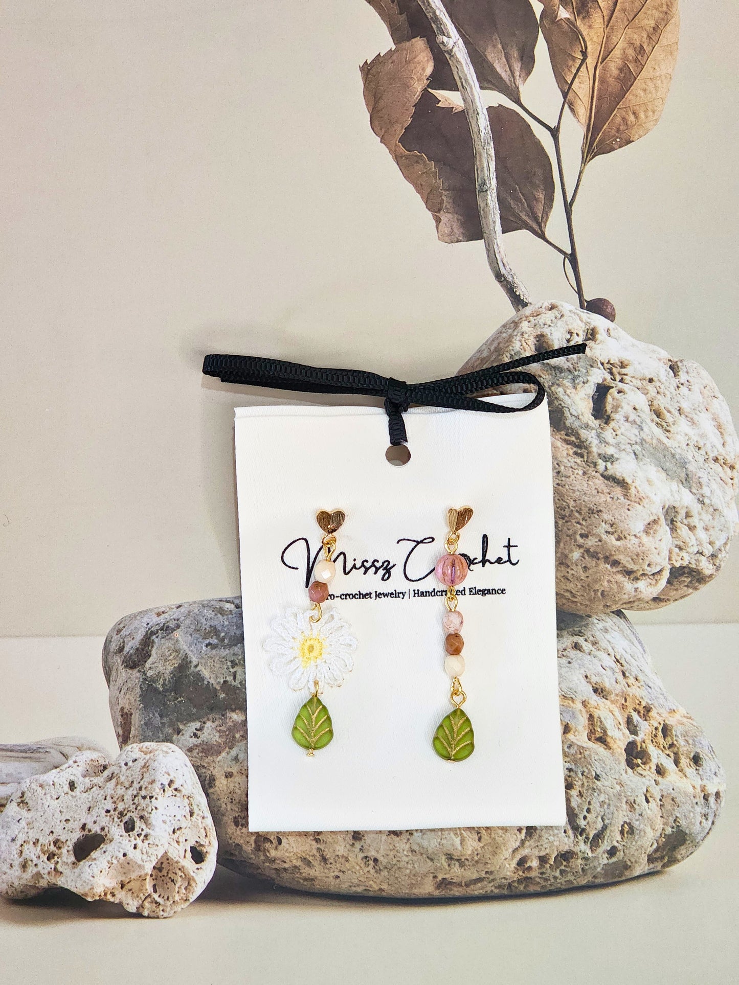 Handcrafted daisy asymmetrical earrings with vintage glass beads & 18K gold-plated ear hooks.  