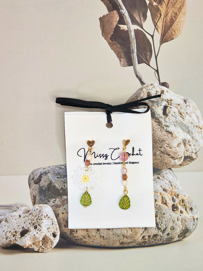 Handcrafted daisy asymmetrical earrings with vintage glass beads & 18K gold-plated ear hooks.  