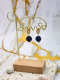 Handcrafted deep blue crochet pearls inspired by the mysterious beauty of Tahitian pearls. Finished with 18K gold-plated lace studs.